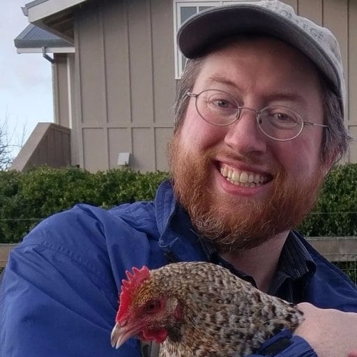 picture of michael goode with a rooster